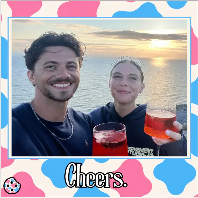 Will and Soph smiling and holding drinks.